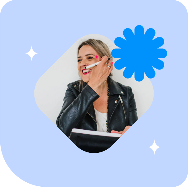Photo of Jo Conlon laughing while holding a pen and notebook, on a light blue background with a blue flower graphic.